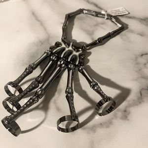 Glow in the dark skeleton hand cuff